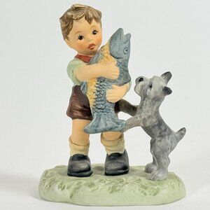 Goebel Hummel Prize Catch BH300 Boy With Dog Fish 2005 4.75 Inch Thailand